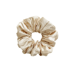 Champagne gold silk scrunchie with high elasticity and oversized pleated design