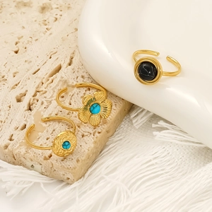 Vintage gold turquoise ring set with black marble stones and ornate adjustable bands