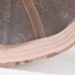 Detail of the breathable mesh fabric and reinforced inner stitching of the baseball cap