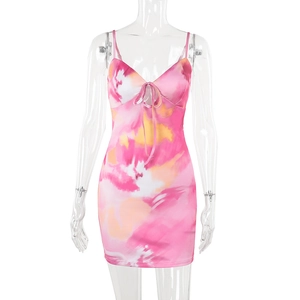 Detail view of pink tie-dye mini dress with front drawstring and cutout design