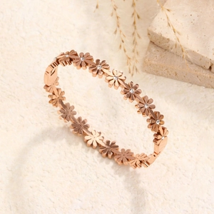 Bracelet jon jonc marguerite en acier inoxydable or rose avec zircons blancs pour femme