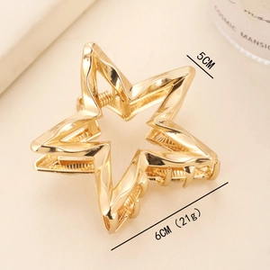 Golden hollow star metal hair claw clip minimalist alloy hair accessory 6cm x 5cm size