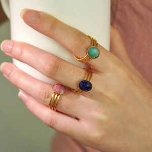 French style gold stainless steel open rings with colorful oval gemstones on model