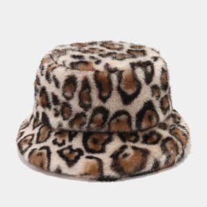 Detailed close-up of fluffy leopard print faux fur bucket hat with soft winter texture