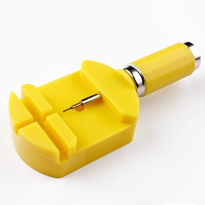 Yellow plastic watch band link remover tool with metal needle for strap adjustments