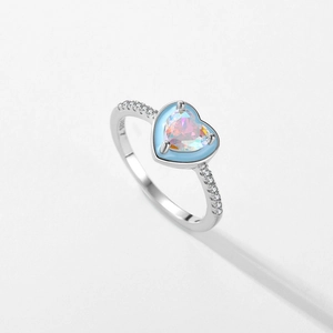 S925 silver ring with rainbow heart zircon and blue enamel frame on white background