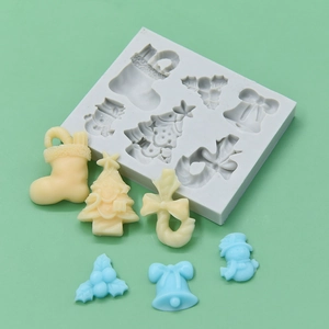 6-cavity Christmas silicone mold featuring tree, sock, and snowman shapes for DIY baking