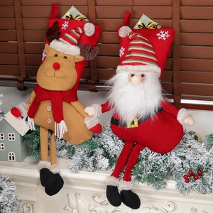 Festive Christmas stockings with Santa and reindeer on a warm mantelpiece decor