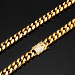 Close-up of 12mm gold Cuban link chain showing the iced-out diamond clasp detail