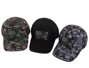 Detailed view of breathable laser-cut mesh and flag patches on outdoor baseball caps