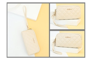 Detail view of cream quilted long wallet for women with dual zippers and wristlet strap