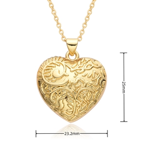 Detail of gold heart pendant showing dimensions 25mm by 23.2mm with embossed patterns