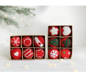 Close-up of wool felt Christmas balls with festive patterns in a kraft gift box