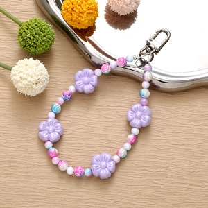 Pastel flower beaded mobile phone charm with purple floral beads and metal clasp