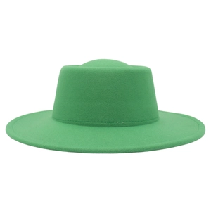 Detail of a bright green flat top wool felt fedora with fine stitching on wide brim