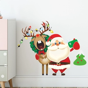 Christmas wall stickers featuring Santa and reindeer on white wall for home decor