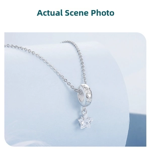 Détail de perle étoile et lune en argent s925 avec pendentif étoile en zircon brillant