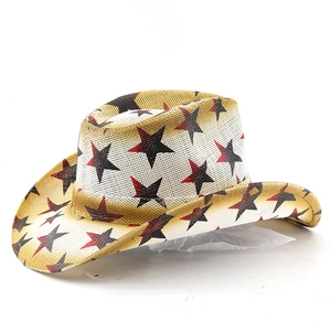Detail of western straw hat with woven texture and red gradient star print patterns