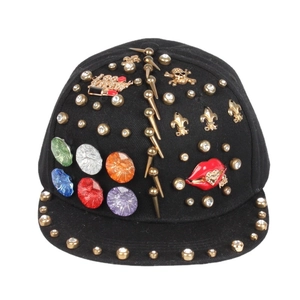 Hip hop snapback hat featuring punk rivets, colorful gemstones, and skull charms on black