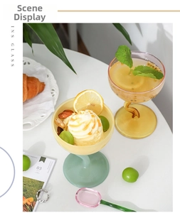 Close-up of twisted stem glass bowl for ice cream and desserts with colorful accents