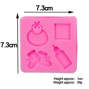 Pink silicone baby-themed fondant mold featuring bottle, shoes, and bib designs