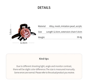 Detailed size specifications for pink rose and black bow claw clip hair accessory