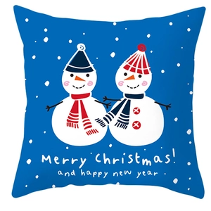 Detailed view of square blue Christmas pillowcase featuring a snowman and holiday greetings