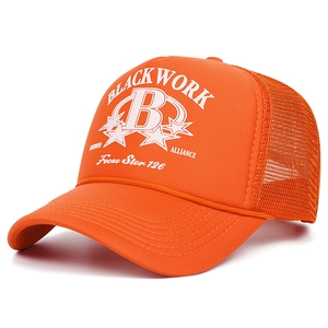 Detail of vibrant orange trucker hat with foam front and breathable mesh back