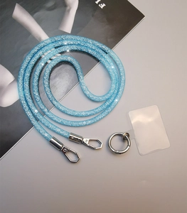 Blue sparkling mesh rhinestone phone lanyard with metal clasps and clear connector pad
