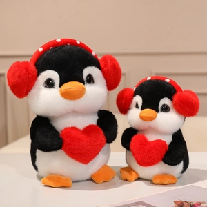 Plush penguin toy set with red earmuffs and heart in two sizes for gift decoration