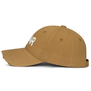 Retro distressed baseball cap in dark camel with white 3D letter embroidery and torn brim