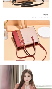 Close-up of contrast color patchwork handbag showing leather strap and metal buckle details