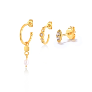 Three-piece golden earring set with white pearl pendant and shimmering zircon crystals