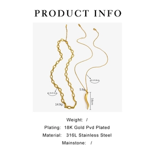 Detail of 18K gold PVD plated stainless steel horn pendant and chunky chain necklace set
