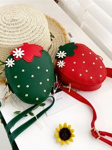 Cute strawberry-shaped crossbody bag for girls featuring gold studs and floral details