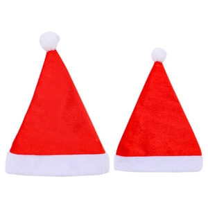 Classic red velvet Christmas hats for adults and children with white plush trim and pompom
