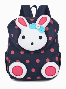 Kids navy blue polka dot canvas backpack featuring a plush 3D bunny design for toddlers