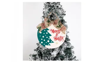 Close-up of wooden Christmas sign with Merry & Bright text and a festive bow