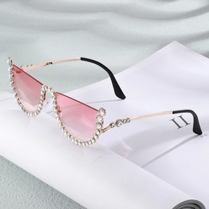 Chic cat-eye half-frame sunglasses with pink lenses and sparkling crystal embellishments