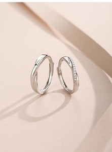 Detail of S925 silver Mobius rings showing mirror polish and cubic zirconia inlay