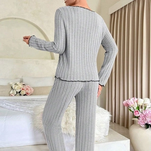 Women's grey ribbed pajama set with lettuce trim detail and comfy long sleeves