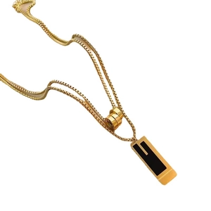 Double-layered golden stainless steel sweater necklace with black geometric pendant