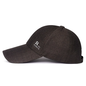 Business casual dark grey sports baseball cap with extended brim and side sport logo