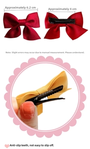 Detail of colorful bow hair clips showing dimensions and non-slip alligator clip design