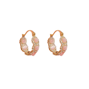 Elegant gold-tone hoop earrings with pink cat-eye stones and cubic zirconia accents