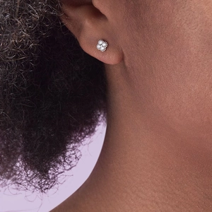 Detailed view of S925 silver turquoise petal stud earrings with zircon micro-inlay for women