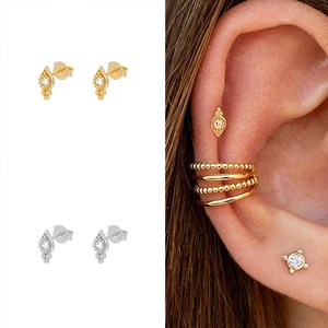 S925 silver needle teardrop earrings with zircon eye accents in gold and silver finish