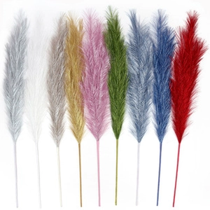 Detailed view of 55cm artificial pampas grass stems in nine vibrant color variations