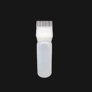 Detail of 170ml plastic squeeze bottle with comb applicator and oz scale markings