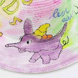 White straw sun hat with purple elephant hand-painted DIY art and musical notes